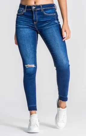 Blue Jeans With Ripped Hem