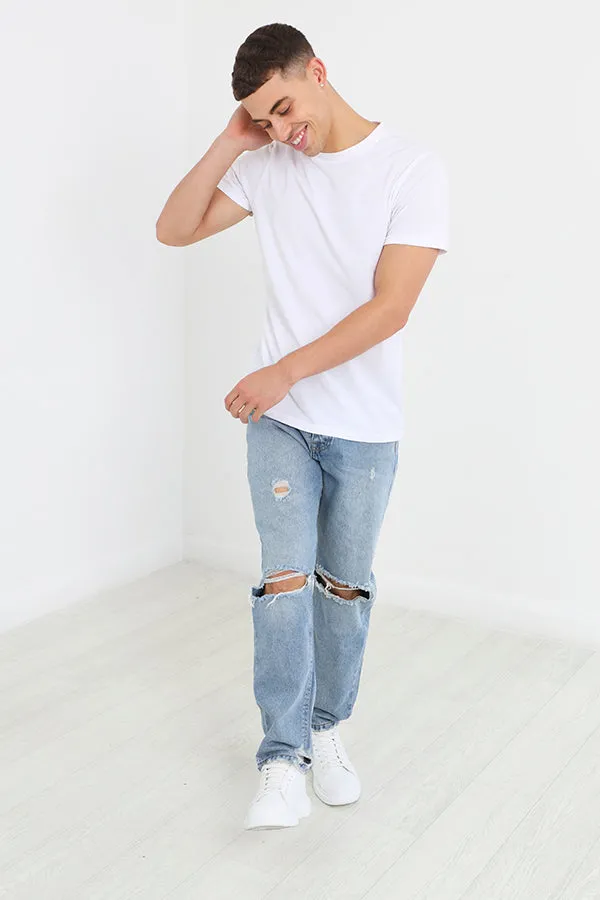 LIGHT BLUE WASH LOOSE FIT RIPPED DENIM JEANS