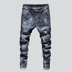 Washed men's ripped jeans